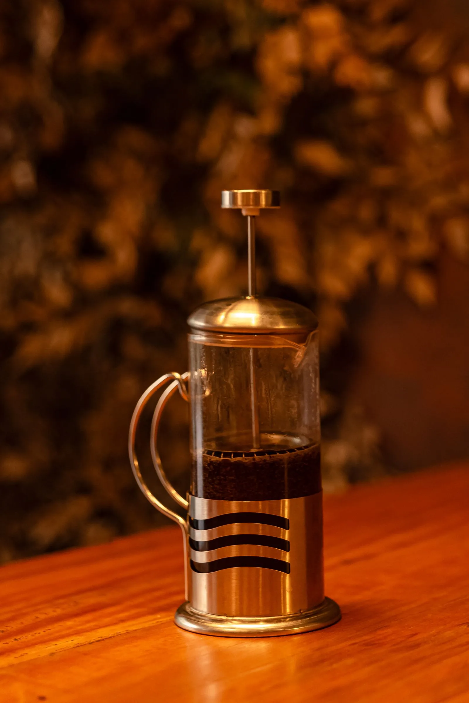 Sediment visible at the bottom of a freshly brewed french press coffee pot