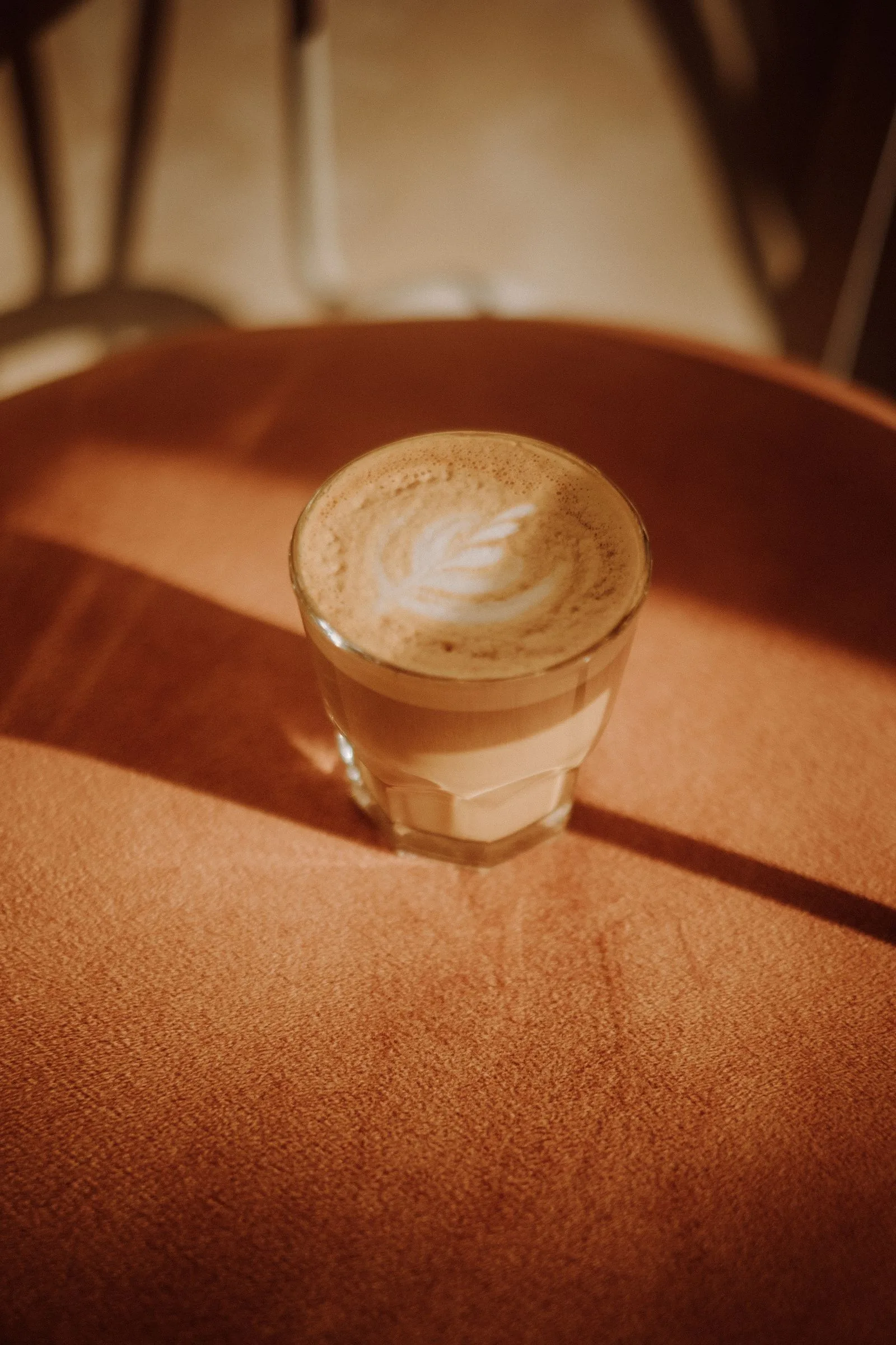 Close-up of espresso shot and steamed milk for latte